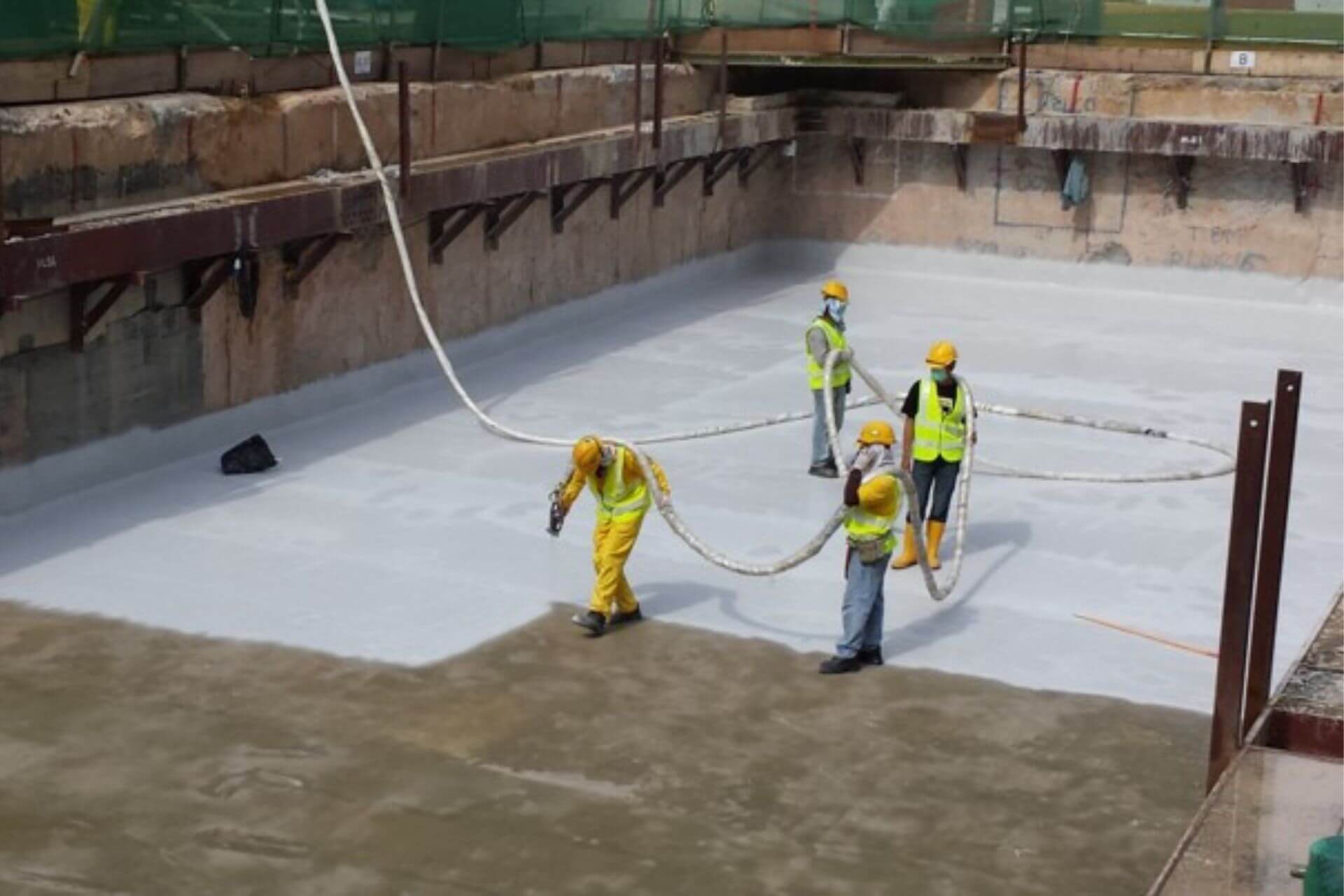 polyurea-waterproofing-for-concrete-roof-slabs-MRT-Line-1-applying-polyurea-waterproofing-coat